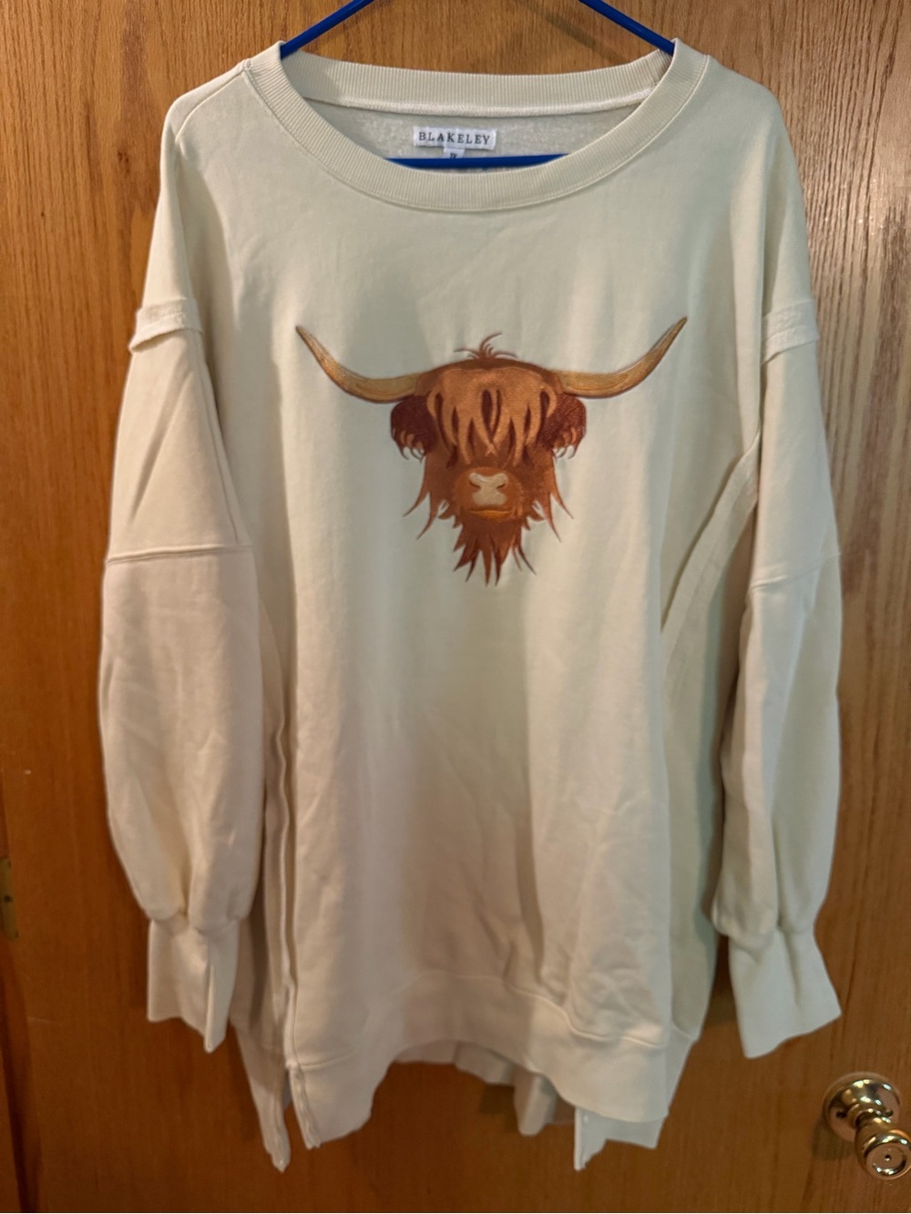 Blakely Cream Highland Cow Pullover Sweatshirt